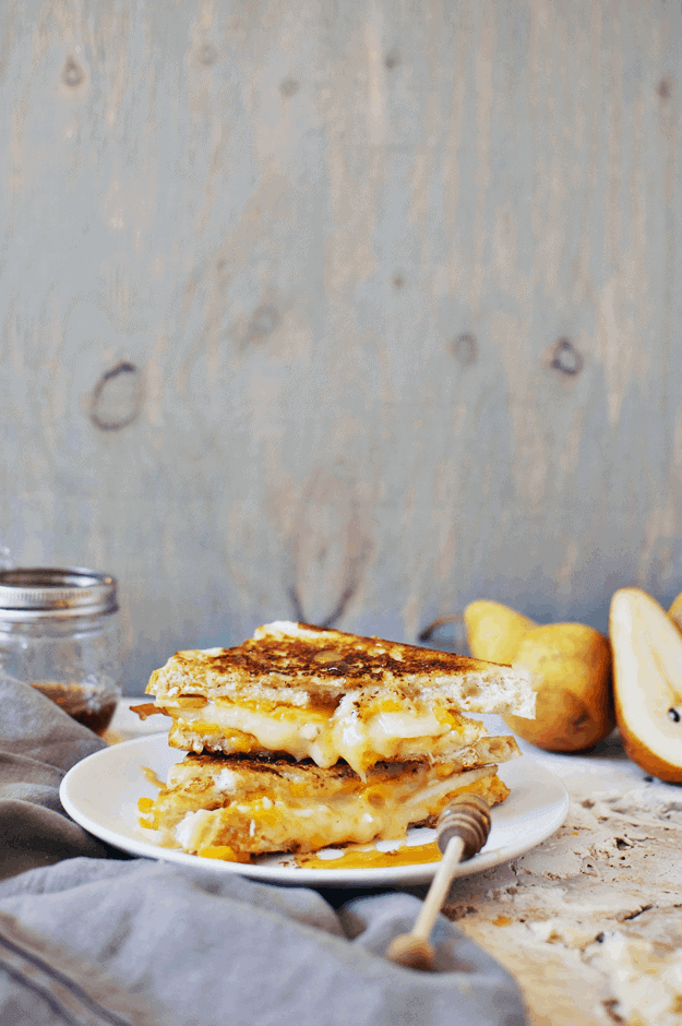 Brie And Cheddar Grilled Cheese With Honey Glazed Pears | grilled cheese recipes, glazed pear recipe, grilled cheese sandwich, gourmet grilled cheese, easy lunch recipes || The Butter Half via @thebutterhalf #grilledcheese #glazedpears #easylunch